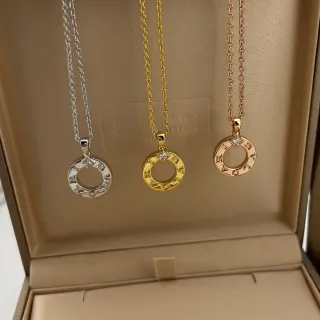 Bvlgari B.zero1 चाँदी सोने का ओपन रिंग पेंडेंट एंग्रेव्ड ब्रांड लेटरिंग नेकलेस
