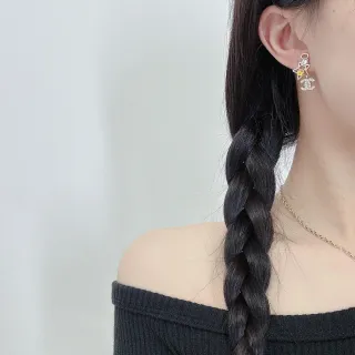 Aretes Chanel plateados amarillos colgantes con cristales incrustados