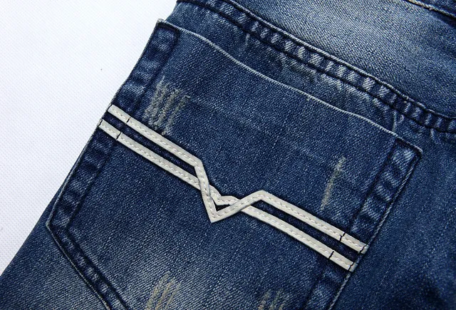 Diesel Distressed Straight-Leg Medium-Wash Blue Jeans 14