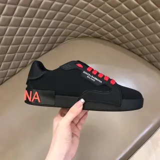 Dolce & Gabbana Tênis lifestyle pretos e laranjas sem cadarço slip-on sola de borracha esculpida