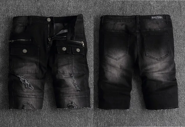 Shorts en denim noir déchirés avec poches cargo et accent de fermeture éclair 2
