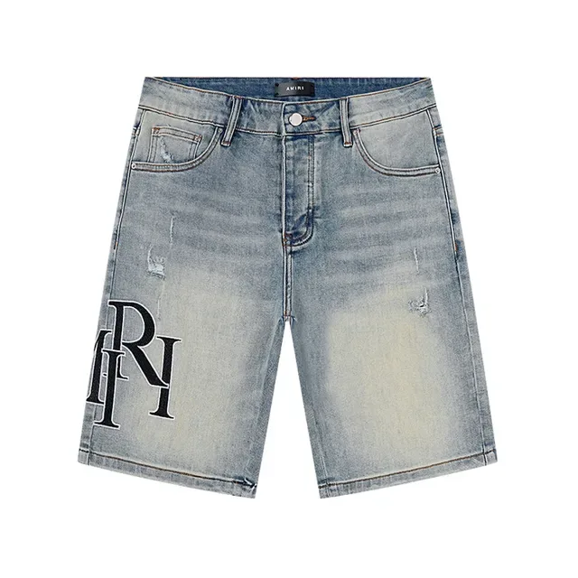 Shorts en jean bleu noir lavé clair déstructuré de longueur mi-cuisse 2
