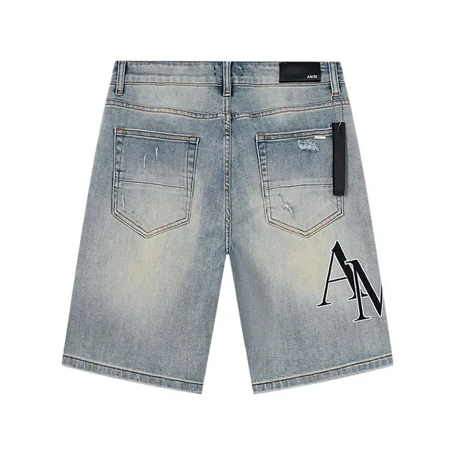 Shorts en jean bleu noir lavé clair déstructuré de longueur mi-cuisse 3