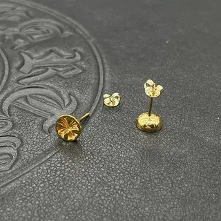 Brincos florais com design de estrela e recortes em ouro e prata 5