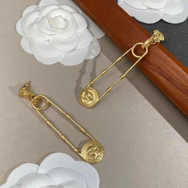 Gold-Tone Lion Head Greek Key Drop Earrings 5