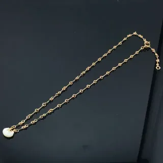 Collier chaîne de maillons or et blanc pierre ovalisée lisse pendentif