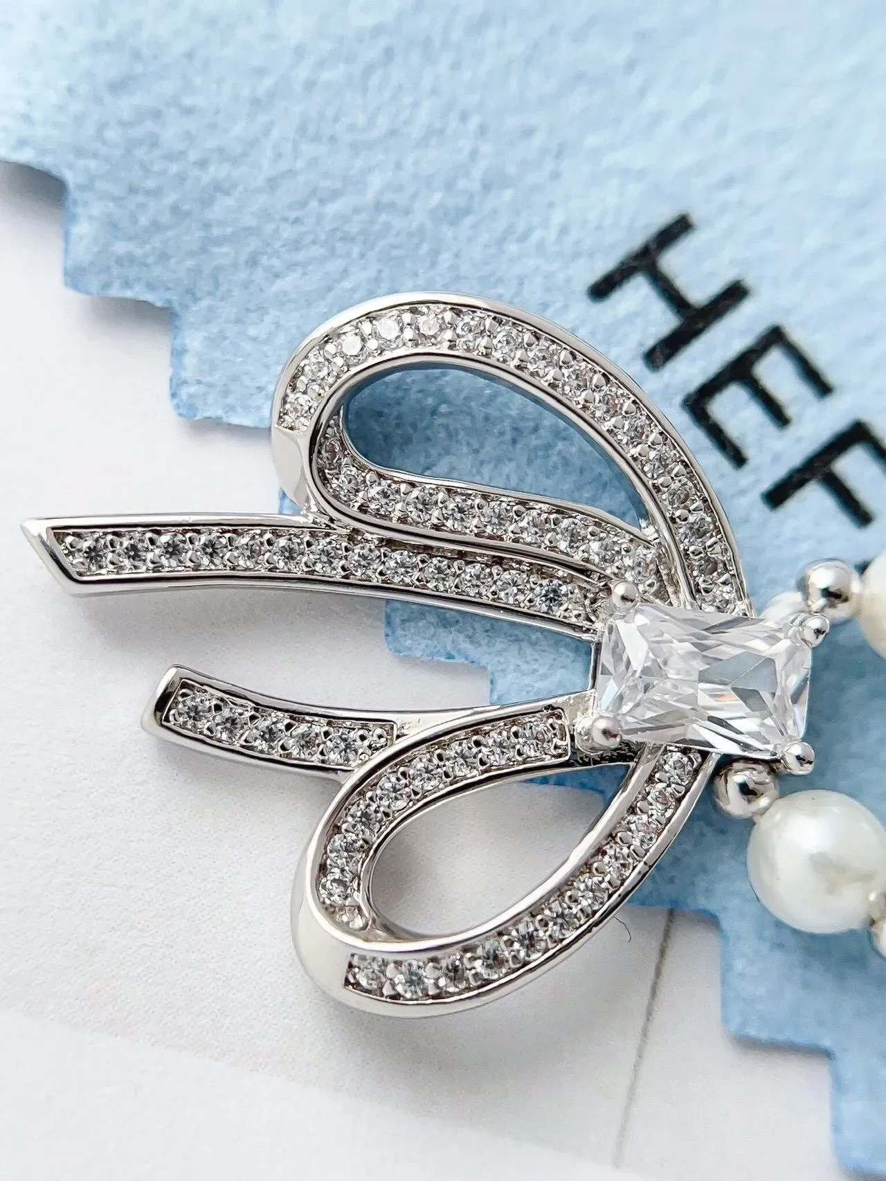 HEFANG Collier à chaîne perles bleues argentées pendentif en forme de nœud 7