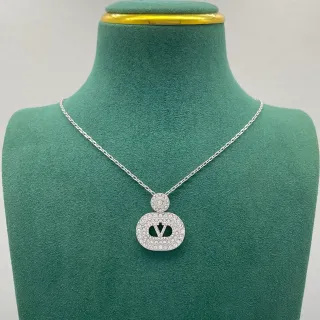 Collier avec pendentif de cristal ovale monogramme pavé