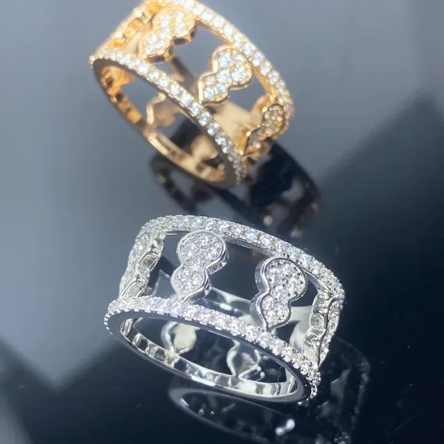 Pave-Set Openwork Quatrefoil Motif Gold and Silver Tone Crystal Rings 2