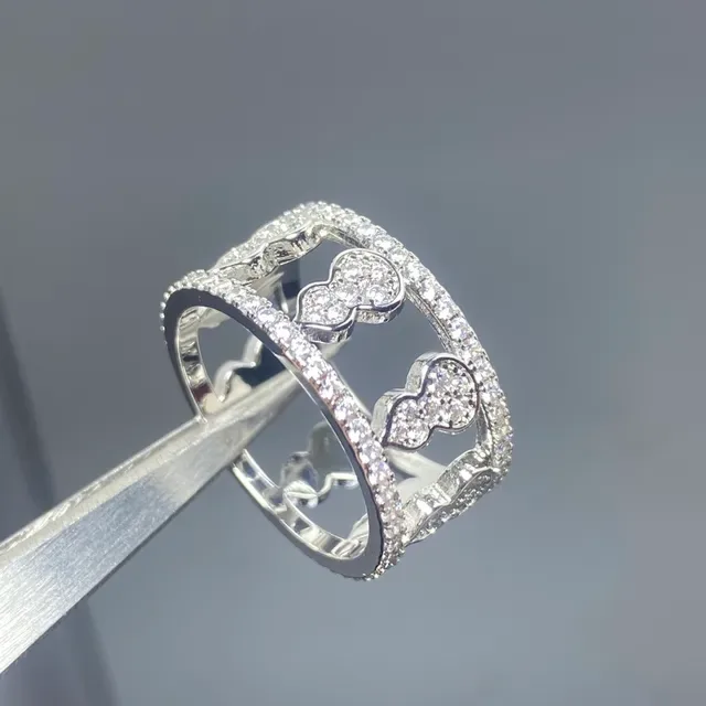 Pave-Set Openwork Quatrefoil Motif Gold and Silver Tone Crystal Rings 3