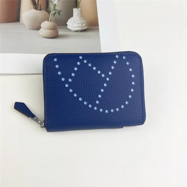 Portefeuille à glissière tout autour en cuir granulaire avec logo perforé 7