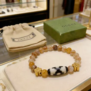 Gucci سوار بيج ذهبي خرز أدوات معدنية