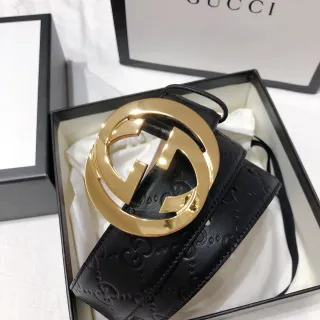 Gucci Double G काला सोना इंटरलॉकिंग बकल GG-एम्बॉस्ड लेदर बेल्ट