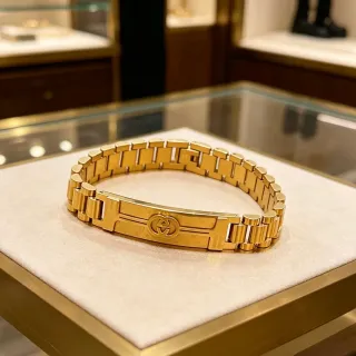 Gucci G-Link سوار ذهبي اللون شعار G متشابك