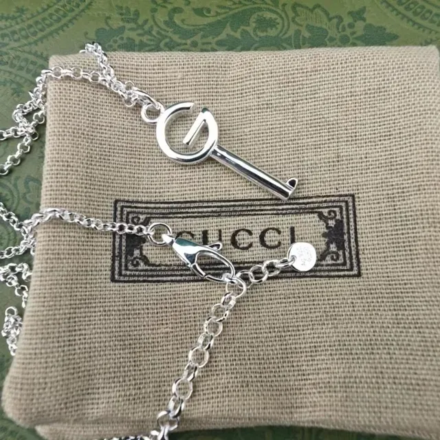 Gucci GG Key Double G Motif أقراط بلون فضي وأسود مينا 3