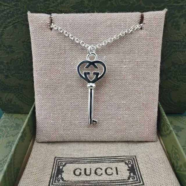 Gucci GG Key Double G Motif أقراط بلون فضي وأسود مينا 8