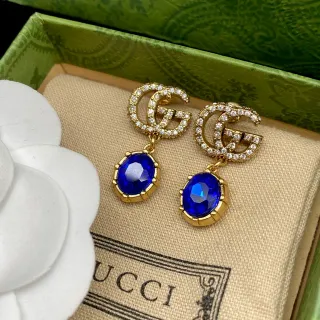 Gucci GG Marmont أقراط قطرة مزينة بكريستالات وأحجار زرقاء