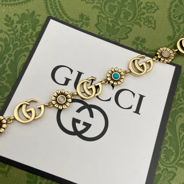 Gucci GG Marmont Gold-Tone Floral and Tiger Charm Bracelet 4