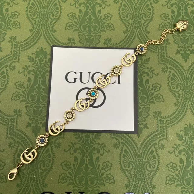 Gucci GG Marmont Gold-Tone Floral and Tiger Charm Bracelet 5