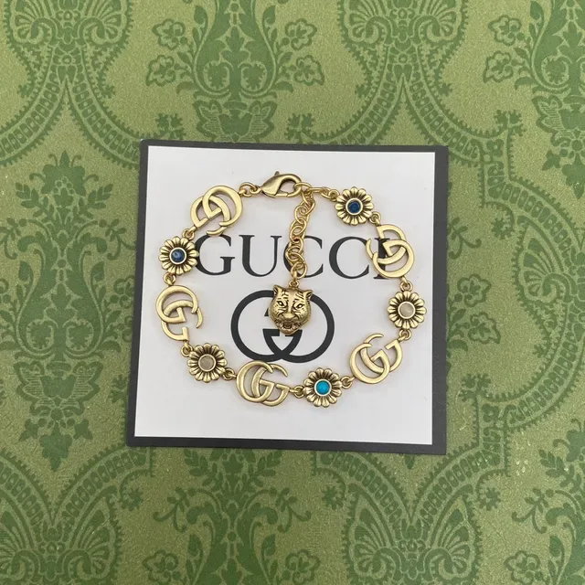 Gucci GG Marmont Gold-Tone Floral and Tiger Charm Bracelet 6