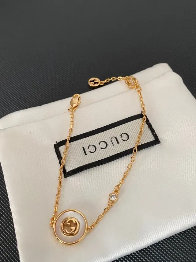 سوار Gucci GG Marmont لؤلؤ أم الخاروف ديسك سلسلة ذهبي اللون 2