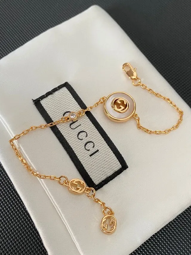 سوار Gucci GG Marmont لؤلؤ أم الخاروف ديسك سلسلة ذهبي اللون 8