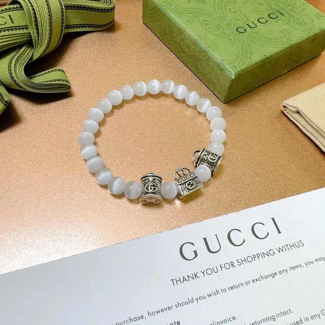 Gucci Pulseira com contas de olho de gato branco e encanto G interlocking 3