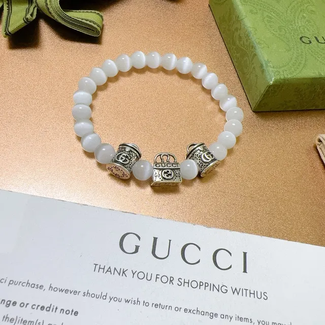 Gucci Pulseira com contas de olho de gato branco e encanto G interlocking 7