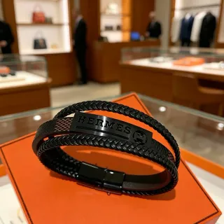 Hermès 黑色编织皮革哑光金属牌手链