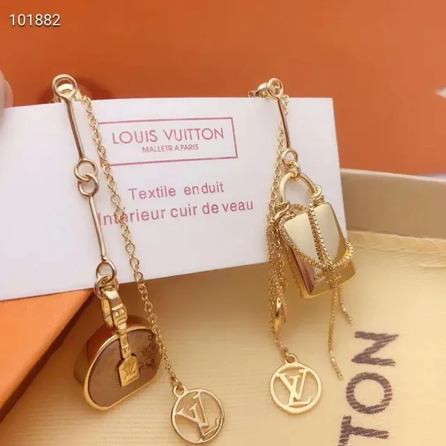Louis Vuitton Asymmetrical Monogram Lock Motif Gold-Tone Earrings 6