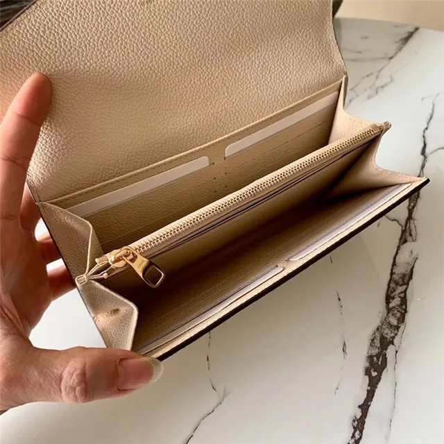 Louis Vuitton محفظة طويلة جلد أسود وذهبي نقش أحادي مونوغرام طية ظرف 3