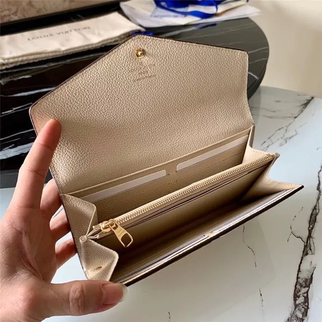 Louis Vuitton محفظة طويلة جلد أسود وذهبي نقش أحادي مونوغرام طية ظرف 5