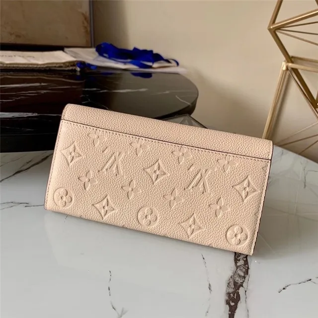Louis Vuitton محفظة طويلة جلد أسود وذهبي نقش أحادي مونوغرام طية ظرف 7