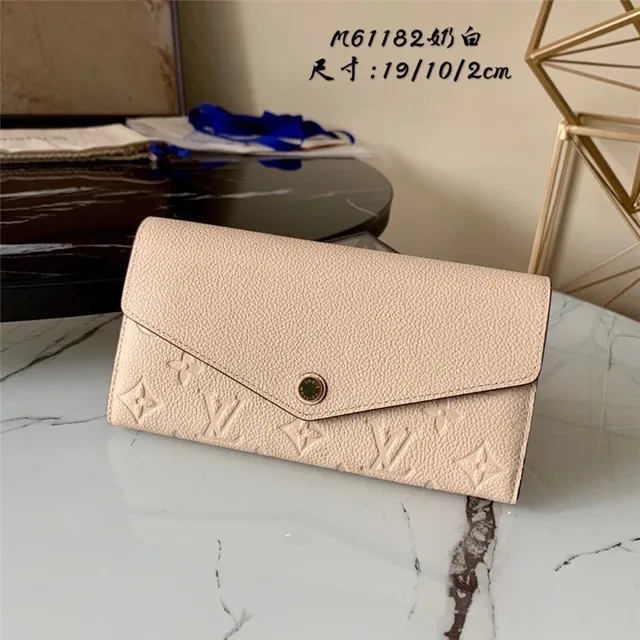 Louis Vuitton محفظة طويلة جلد أسود وذهبي نقش أحادي مونوغرام طية ظرف 9