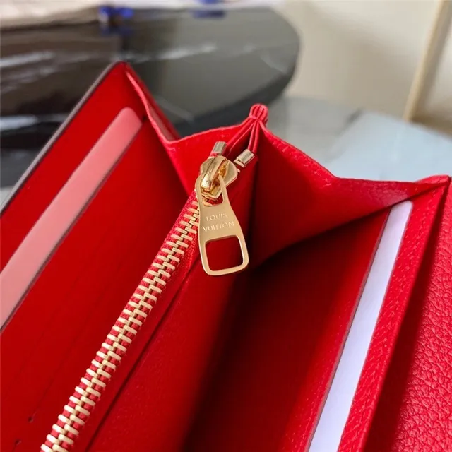 Louis Vuitton محفظة طويلة جلد أسود وذهبي نقش أحادي مونوغرام طية ظرف 11