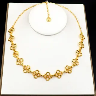 Colar Louis Vuitton elos quatrefoil floral dourados interligados com medalhões LV Monogram