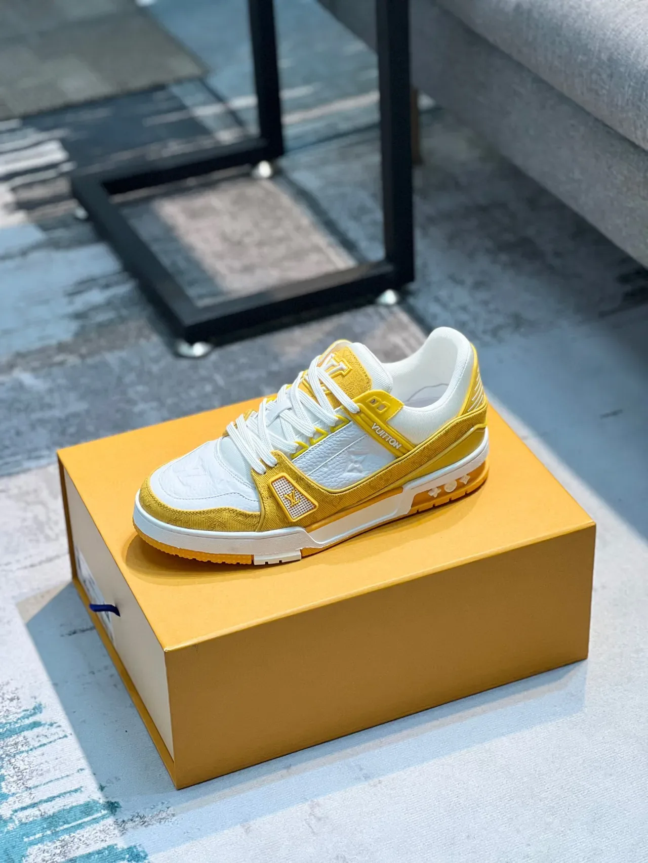 Louis Vuitton LV Trainer Yellow White Monogram-Embossed Leather Contrast-Color Strap Detail Lifestyle Sneakers 1