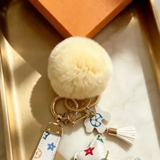 Louis Vuitton Multicolor Beige Monogram Leather Cream Faux-Fur Pom-Pom Phone Accessory