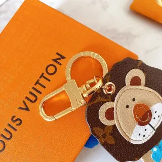 Louis Vuitton ऑरेंज ब्राउन मॉनोग्राम कैनवास लेदर ऐप्लिके बियर फेस हैंडबैग
