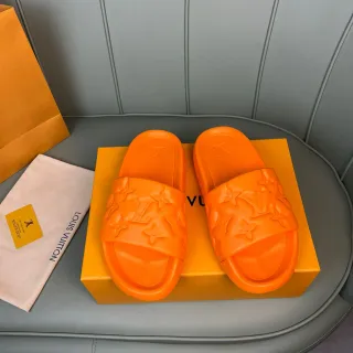 Louis Vuitton Slides برتقالي مطبوع بشعار مولّد مطاطا نعال