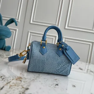 Louis Vuitton संरचित बैरल सिल्हूट डेनिम-टेक्सचर्ड मोनोग्राम जैकार्ड बॉस्टन बैग