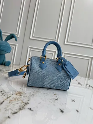 Louis Vuitton 结构桶形轮廓牛仔纹理花卉纹提花波士顿包 2
