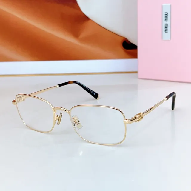 Miu Miu lunettes de soleil vert argent cadre rectangulaire construction métallique 2