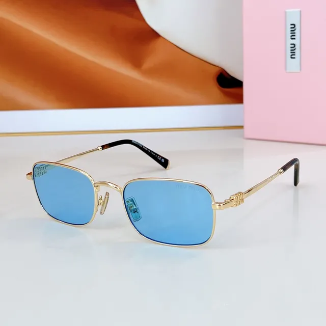Miu Miu lunettes de soleil vert argent cadre rectangulaire construction métallique 4