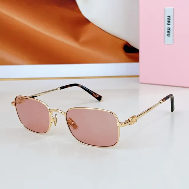 Miu Miu lunettes de soleil vert argent cadre rectangulaire construction métallique 8