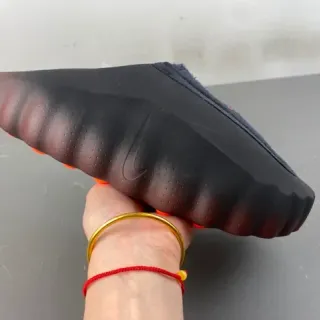 Nike Black Orange Slip-On Sculpted Wavy Midsole Sneakers