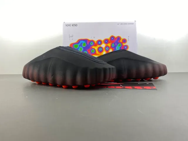 Nike أسود وبرتقالي سليب أون سكالبتد ويفي ميد سول سنيكرز 16