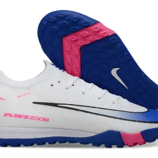 Nike Mercurial Vapor Chaussures de football Turf blanc et bleu, empeigne en maille à coupe basse, lacets asymétriques