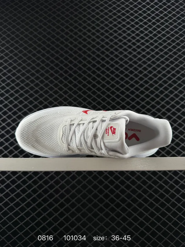 Nike VOMERO PREMIUM Chaussures de course Blanc Rouge 4