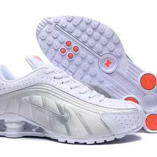 Nike أبيض برتقالي Shox Column Heel Cushioning فضي معدني Swoosh أحذية للأسلوب الحياة